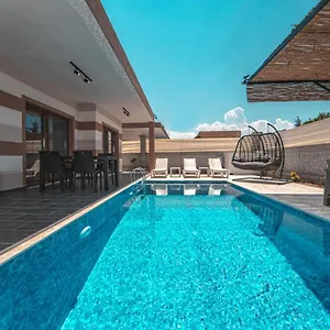 https://portakal-cicegi-villalari.aegeanhotels.net